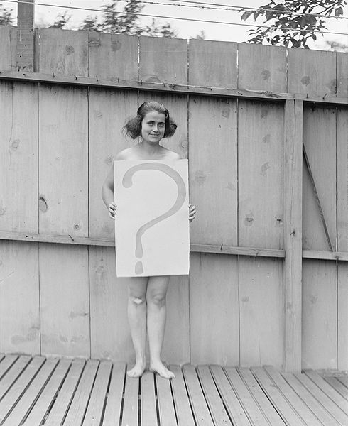 http://commons.wikimedia.org/wiki/File:QuestionMarkWoman1922.jpg