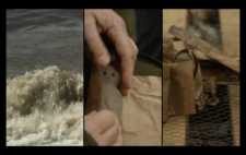 Screen is split vertically into three. Left show choppy sea, the waves white crested. Centre, the figure is wrapped in brown paper. Right a bonfire is built, the figures stacked within it.