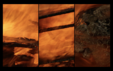 Screen is split vertically into three. Left and centre, the fire burns fierce, the screen intense orange. Right, figures can be glimpsed, encased in wire netting, being consumed by the flames.